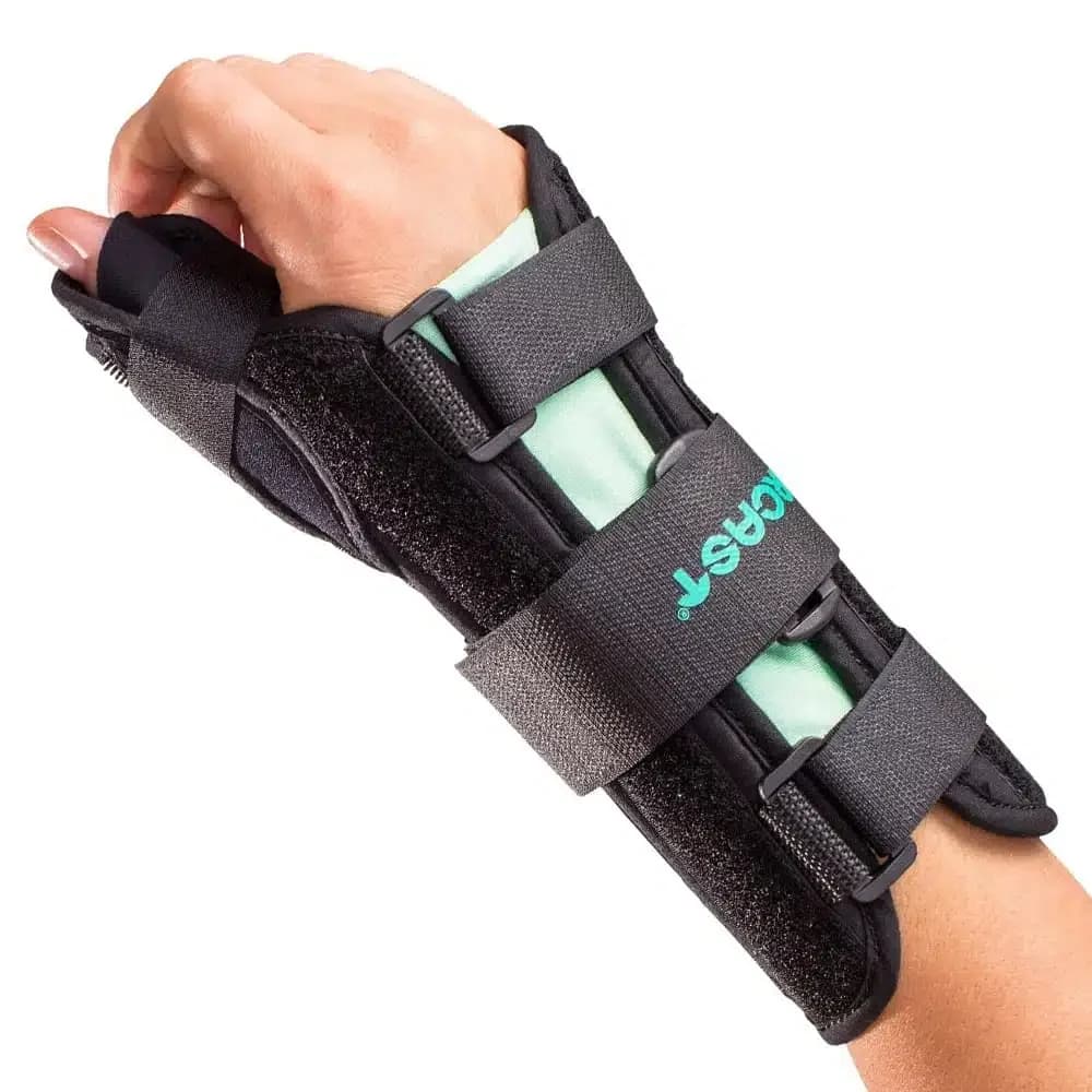An Aircast A2 wrist brace with a thumb support, worn on the forearm