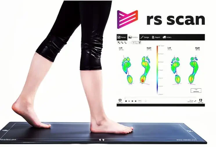 Someone walking barefoot across the RS footscan plate, beside the pressure map it records for each foot